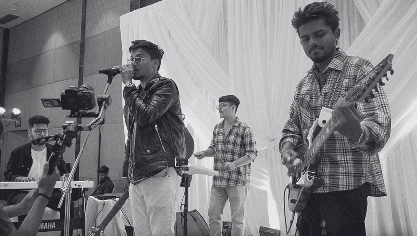 Harsh Shetty performing with a four-piece live band